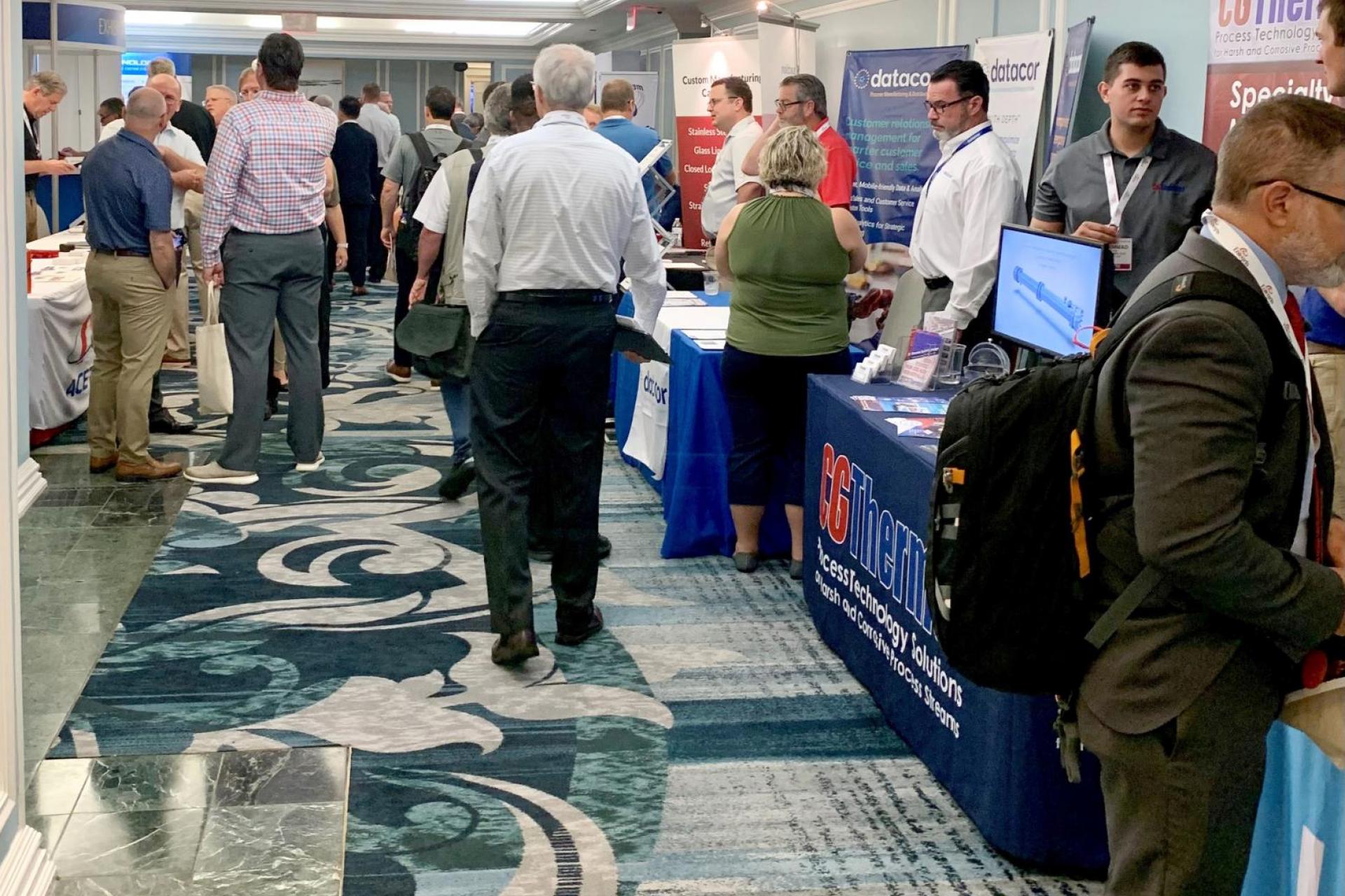 attendees and exhibits at Charleston Place hotel